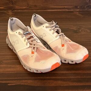 On Running Women's Cloud Sneakers in White and Orange